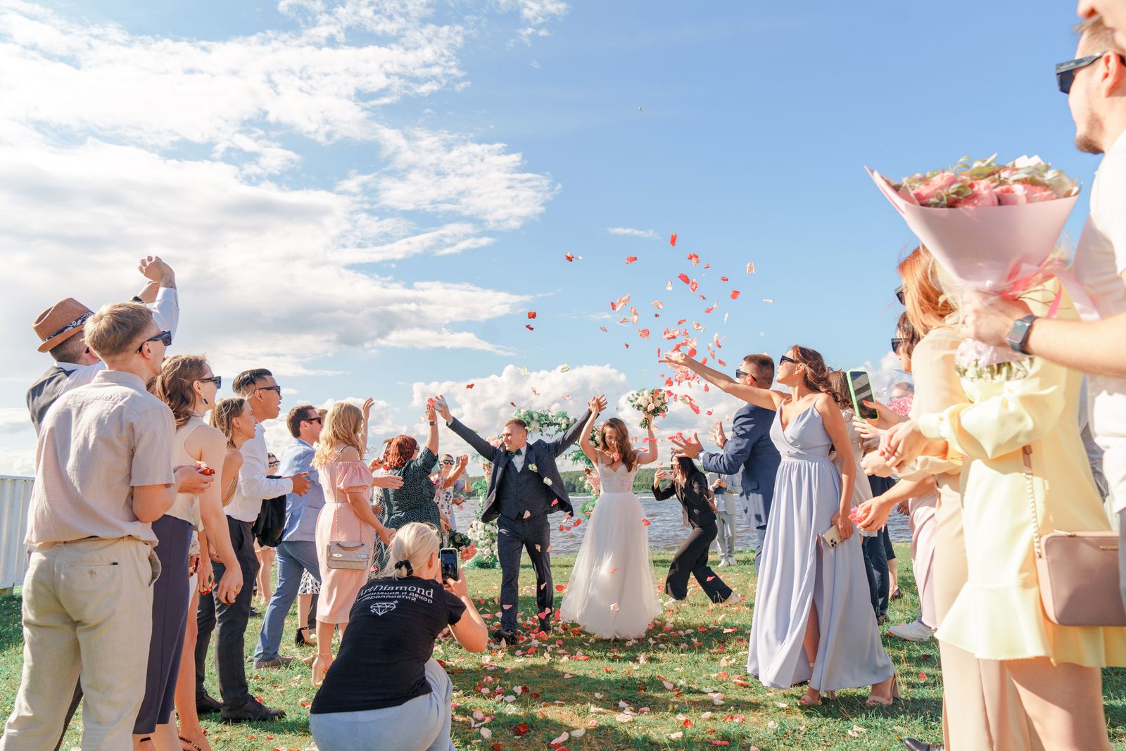 Wedding guests laughing and dancing during the festivities