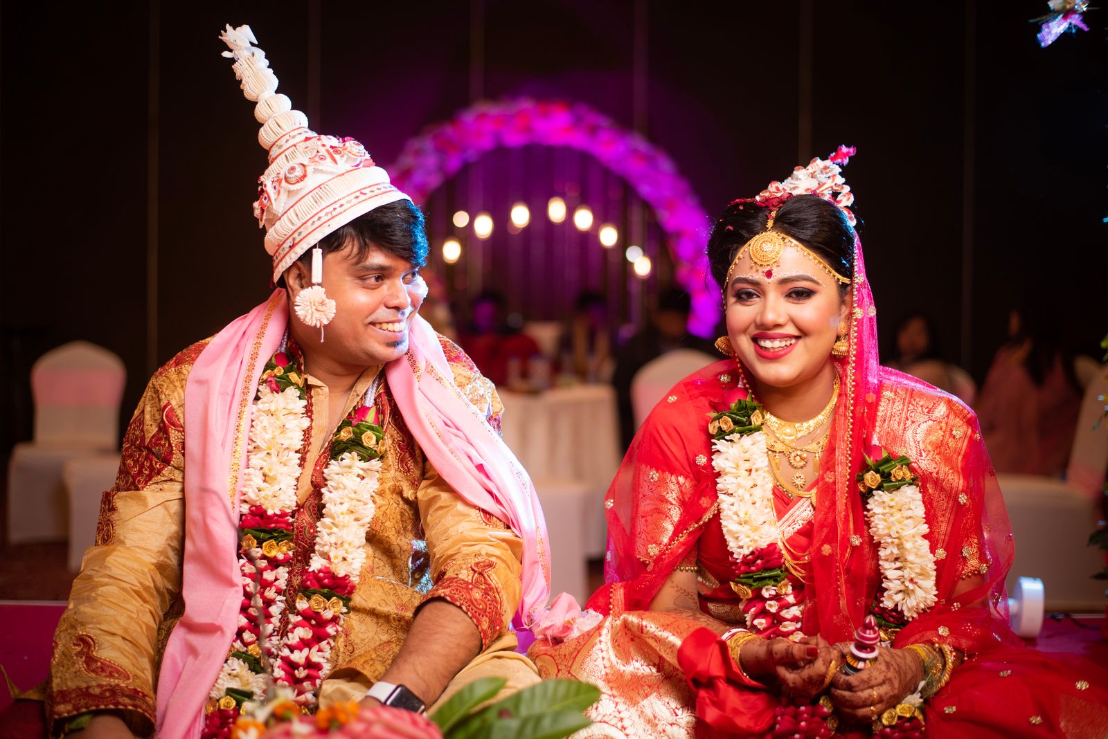 Newlyweds captured in a spontaneous, joyful candid wedding photo